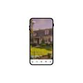 Hausaufnahme mit Smartphone-Fotoaufnahme, zeigt eine private Immobilie im Garten.
